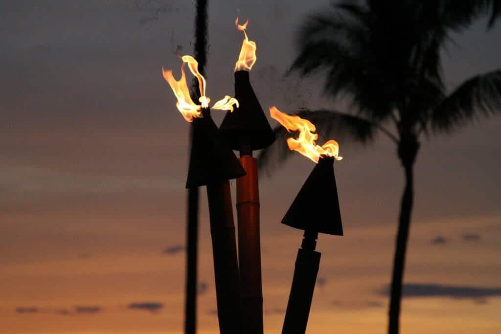 metal Tiki torches at sunset by Kevin Briody | https://www.flickr.com/photos/thekbriodys/2383535550/ via Creative Commons